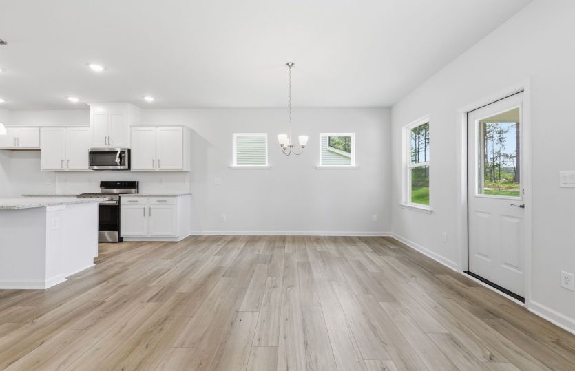 Mitchell - #008 - Everyday Eating Area open to Kitchen with Access to Screened Porch