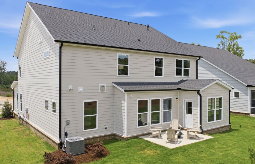 Exterior View shows Outdoor Living Space - This Home will have a Screened Porch - Model Representation