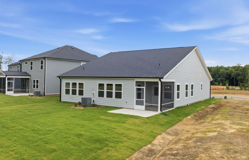 Bedrock #107 - Back Yard View displays Screened Porch & Patio