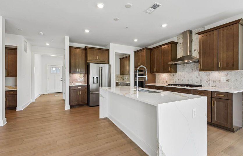 Gourmet Kitchen Features Quartz Countertops - Actual Home