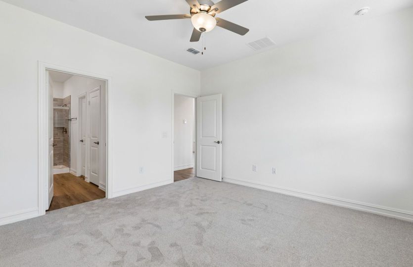 Primary suite with private bath and walk in closet*model representation