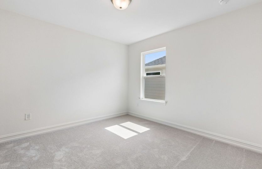Spacious secondary bedroom*model representation