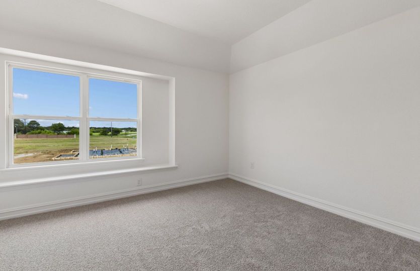 Secondary bedroom with large window