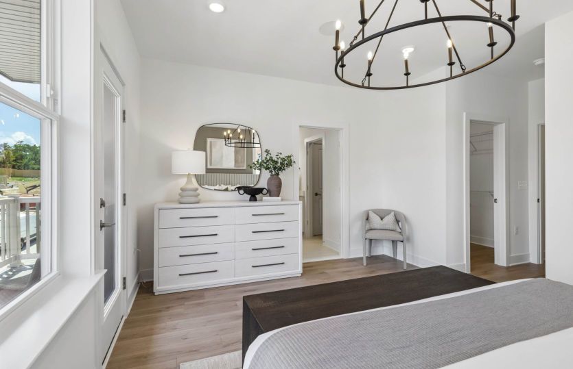 Luxurious Primary Suite with a Walk-In Closet and Ensuite Bath