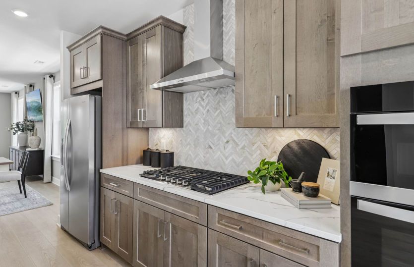 Gourmet Kitchen Features a Tile Backsplash