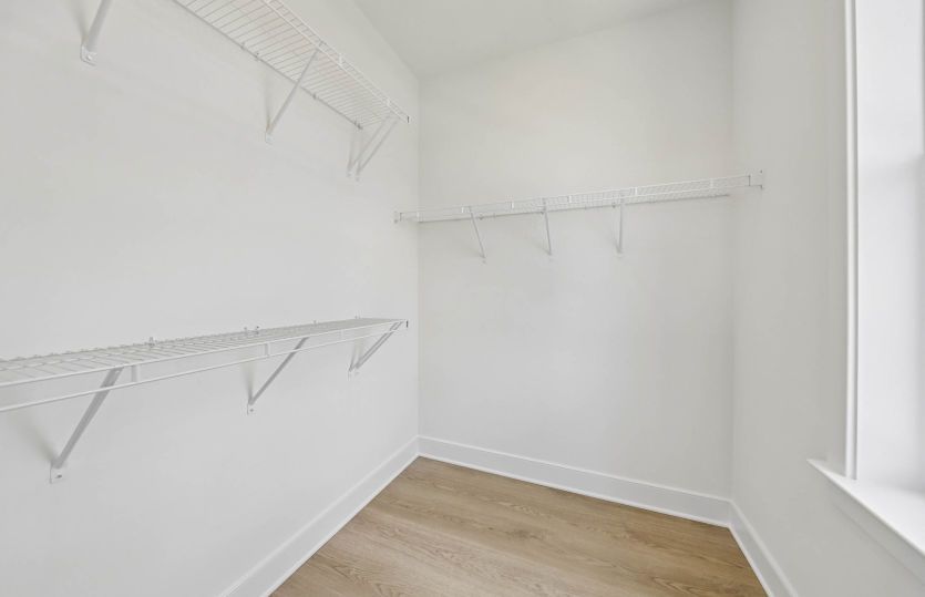 One of Two Walk-In Closets in the Primary Suite