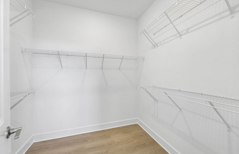One of Two Walk-In Closets in the Primary Suite
