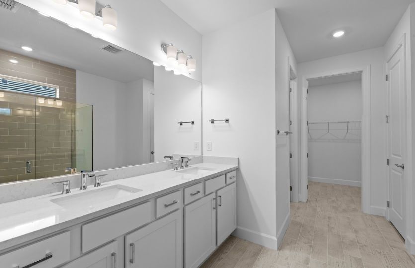 Owners bathroom with dual sinks