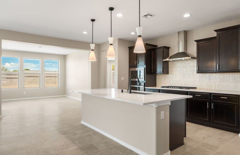 Spacious kitchen with a large center island perfect for gathering and entertaining