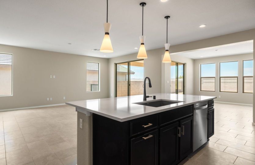 Pendant lighting gives the kitchen a modern look