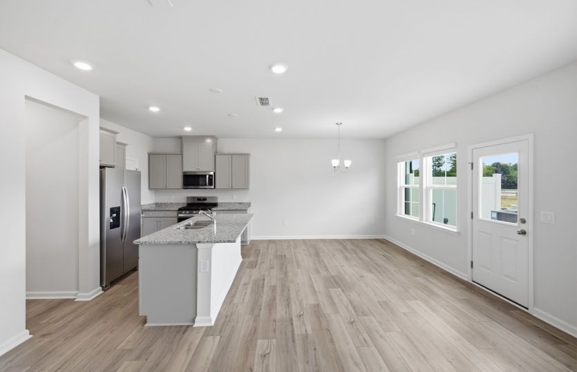 Raritan homesite 14 - Kitchen open to Dining Space - So Convenient for Hosting