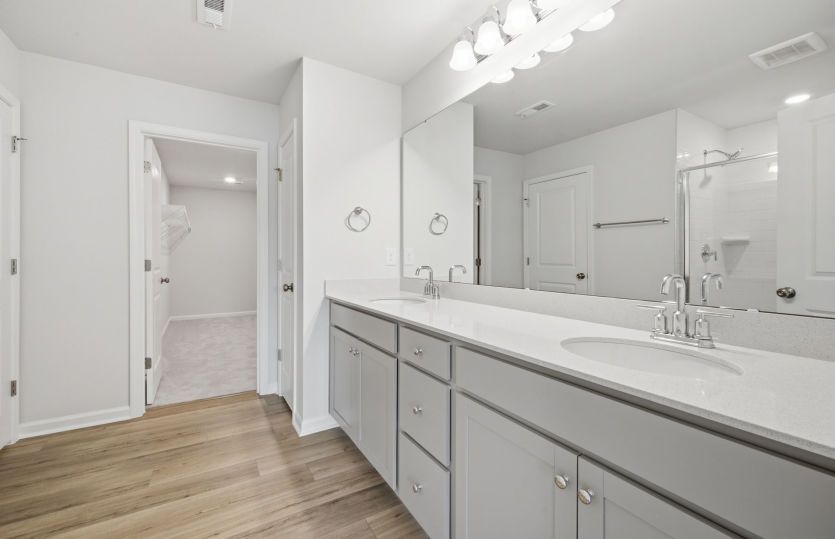 Raritan homesite 14 - Owner's Luxury Bath with Dual Sinks & Linen Closet