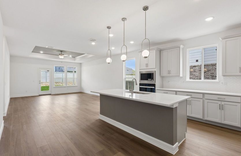 Kitchen with eat-in bartop island