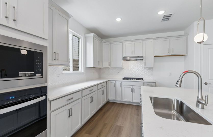 Abundant cabinet space in kitchen