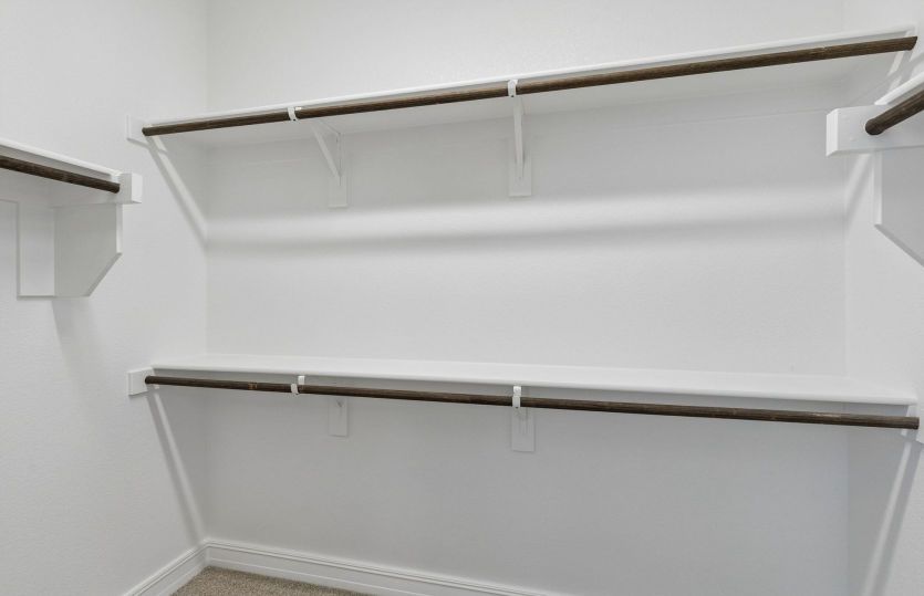Walk-in closet in owners suite