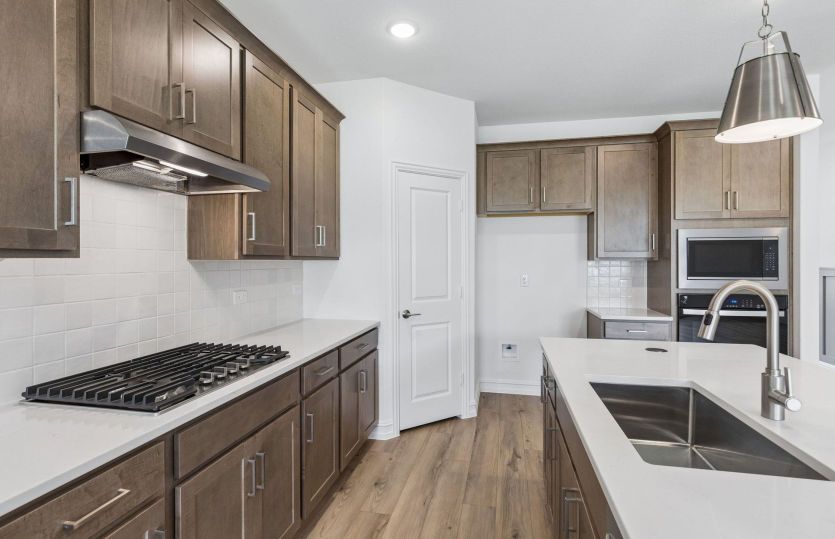 Abundant cabinet space in kitchen