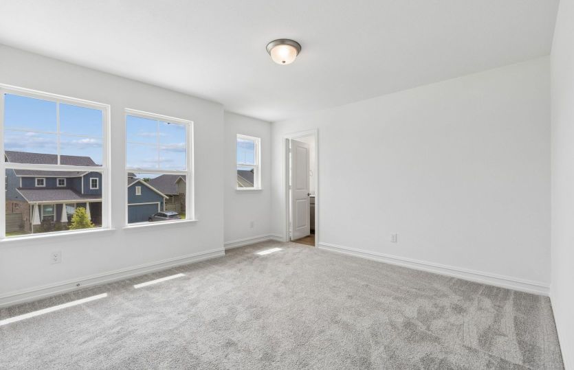 Secondary bedroom with large windows