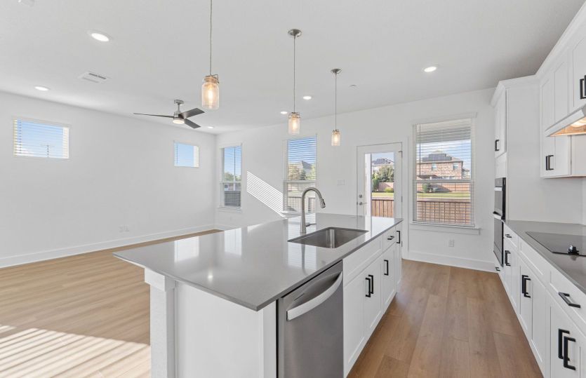 Representative Photo- Kitchen Open to the Gathering Space