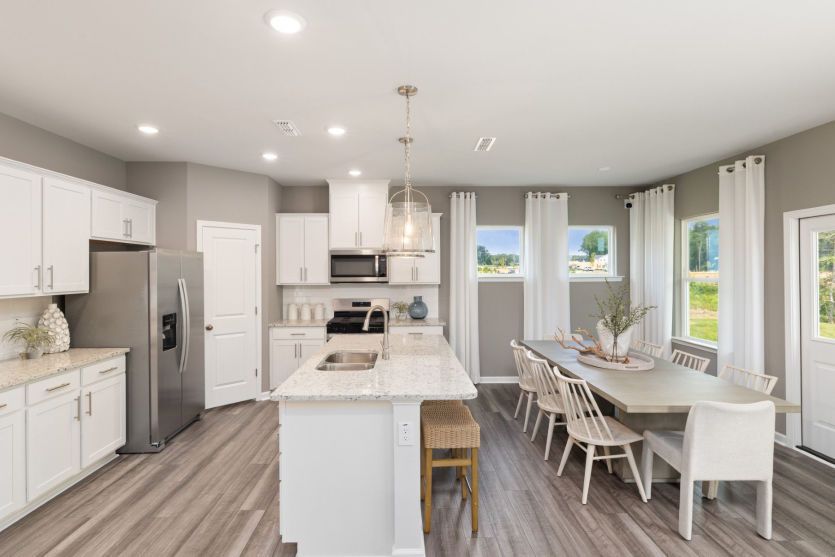 Plenty of Storage and Seating in Kitchen and Dining Area