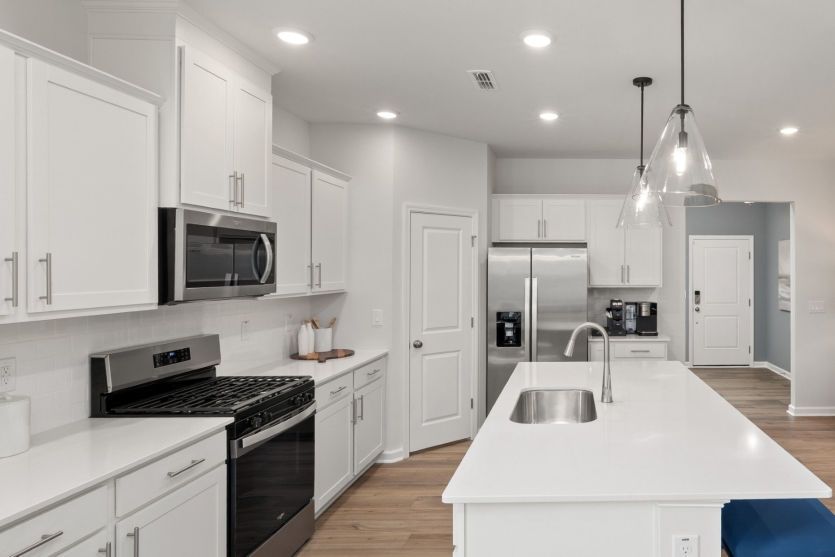Stunning Kitchen with Prep Space & Storage - Model Representation