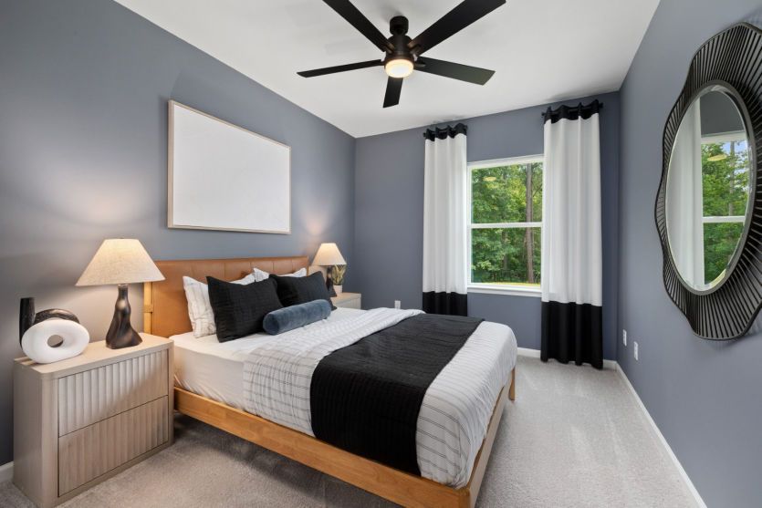 Guest Bedroom Downstairs has Full Bath - Model Representation