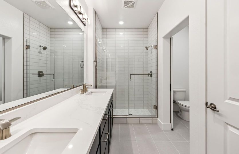Primary bathroom with glass walk in shower