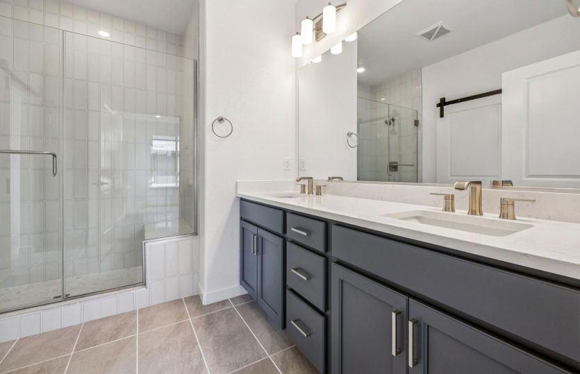 Primary bath with glass walk in shower
