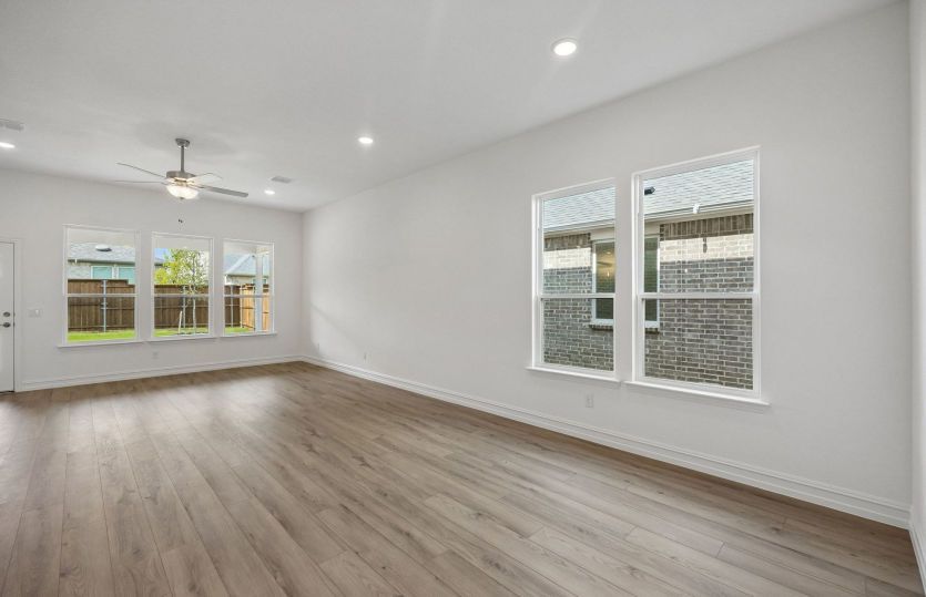 Large windows and natural light in gathering room