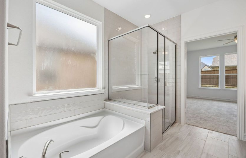 Primary bath with separate tub and shower