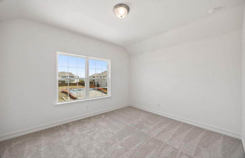 Secondary bedroom with large window