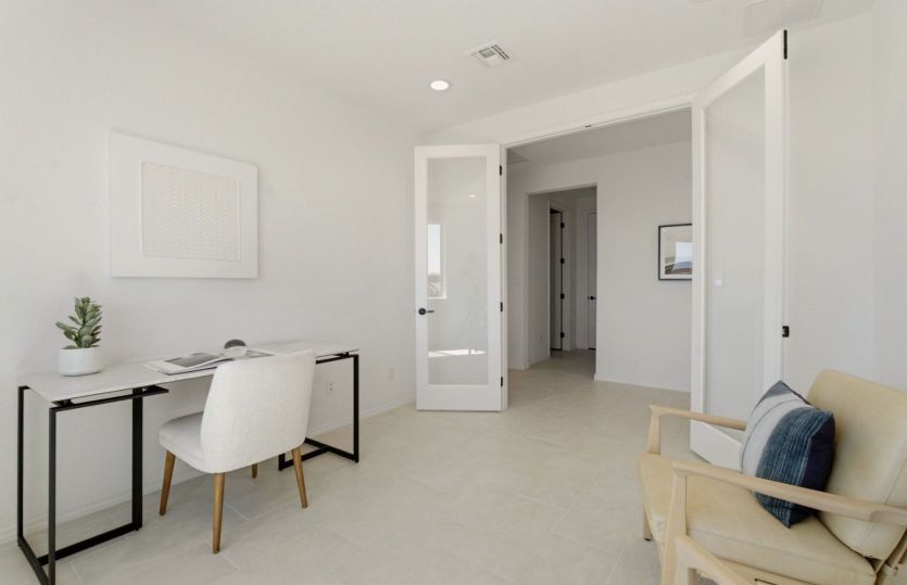Versatile flex room with abundant natural light and stylish French doors