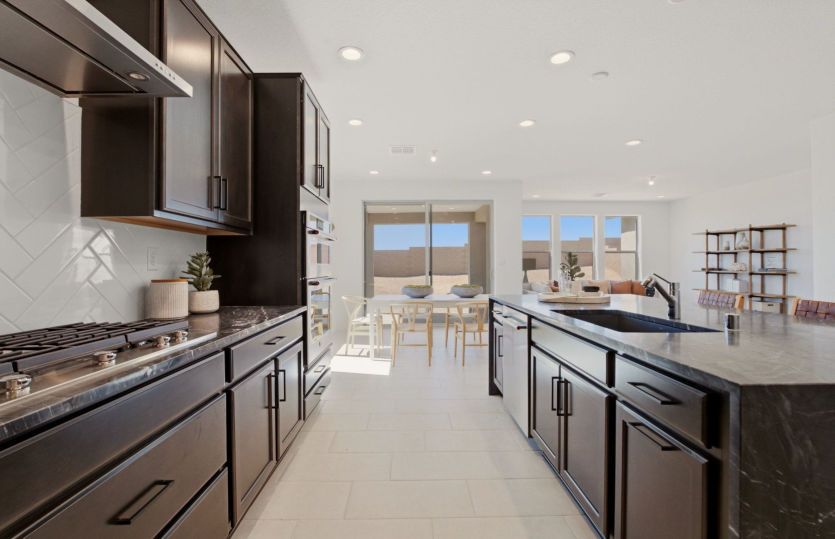 Chef-inspired kitchen with expansive prep space, and a large center island