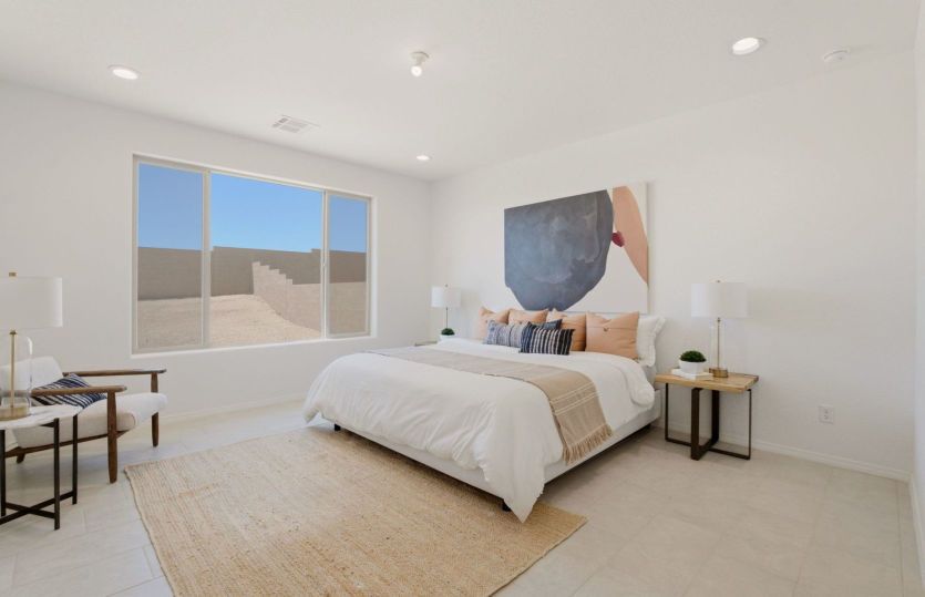 Spacious owner's suite offering a peaceful retreat with abundant natural light