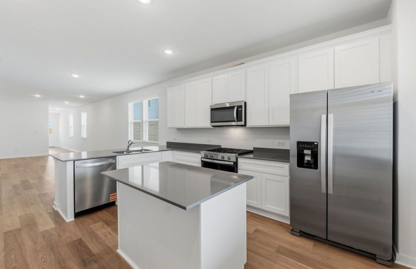 Representative Photo- Kitchen Open to the Gathering Space