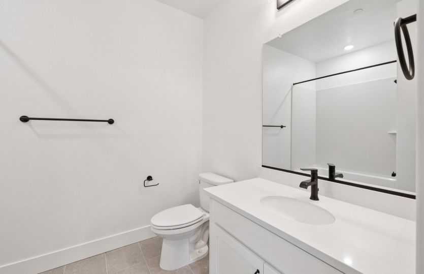 Entry level bedroom suite bath