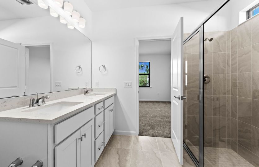 Owners bathroom with dual sinks