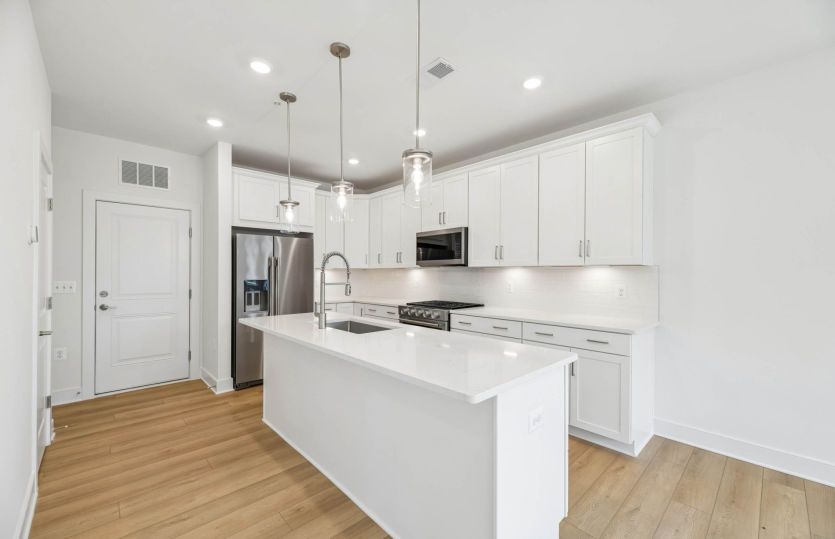 Kitchen with Expansive Island - Actual Home