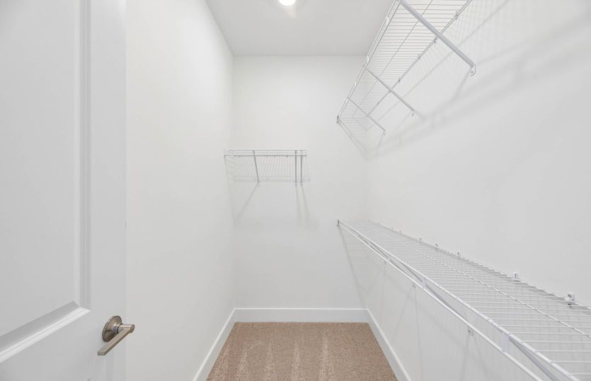 One of Two Walk-In Closets in the Primary Bedroom - Actual Home