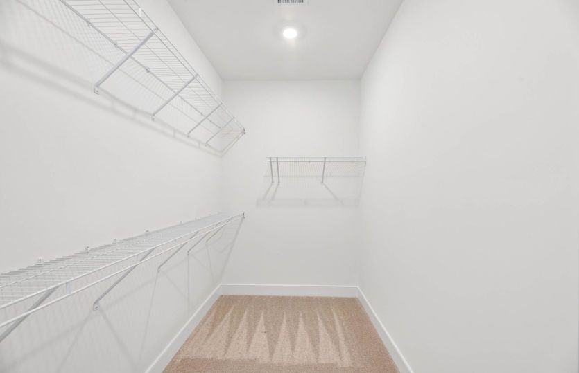 One of Two Walk-In Closets in the Primary Bedroom - Actual Home