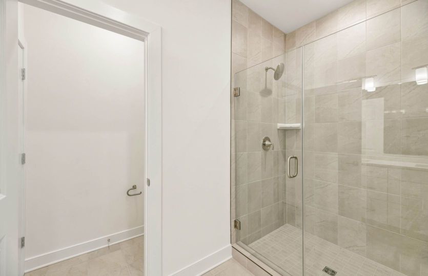 Frameless Glass Shower in the Primary Bath - Actual Home