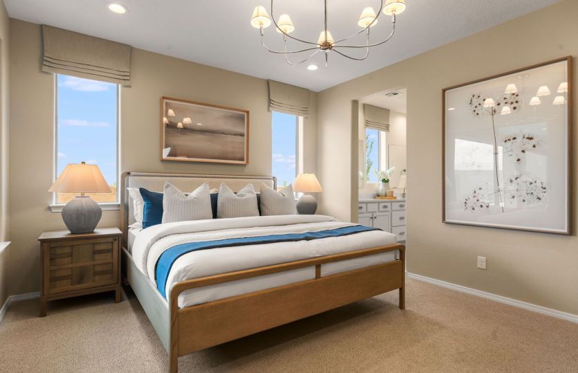 Owner's suite located on the first floor includes it's own private bath and easy access to the laund
