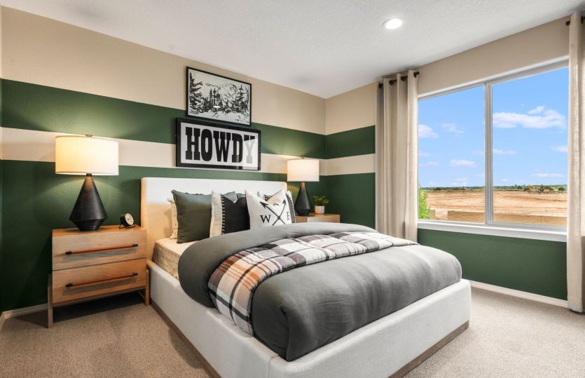 Bedroom 3 provides the perfect space for guests or family.