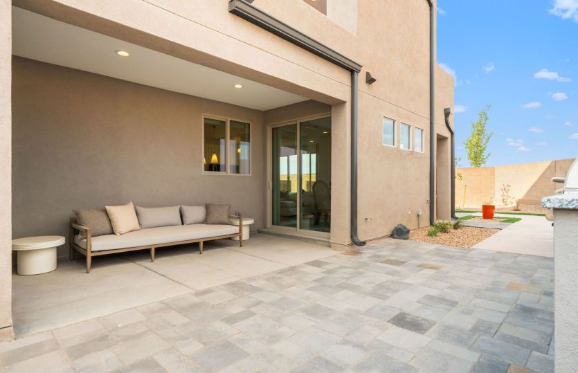 The yard and covered patio of the Ocotillo home design create a very easy-to-maintain outdoor mainte