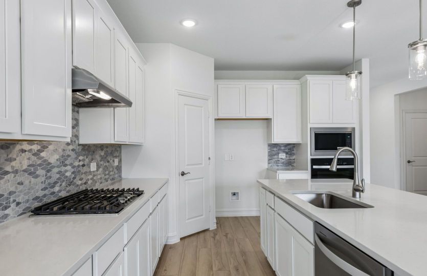 Abundant cabinet space in kitchen
