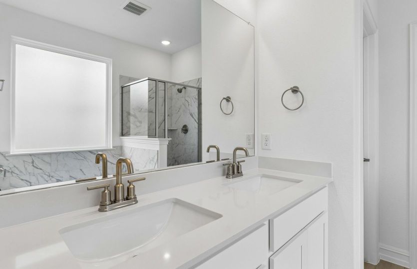 Private owners bath with double vanity