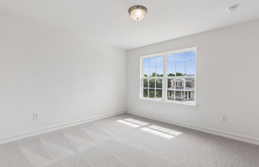 Secondary bedroom with large window