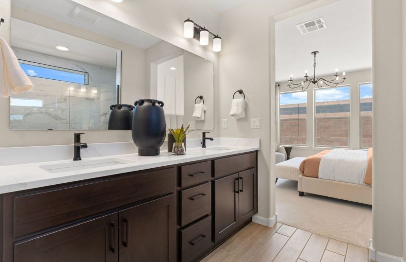The owner's bath offers a double vanity, perferct for getting ready in the mornings.