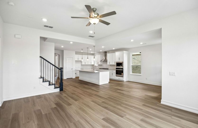 Gathering room with sight of kitchen