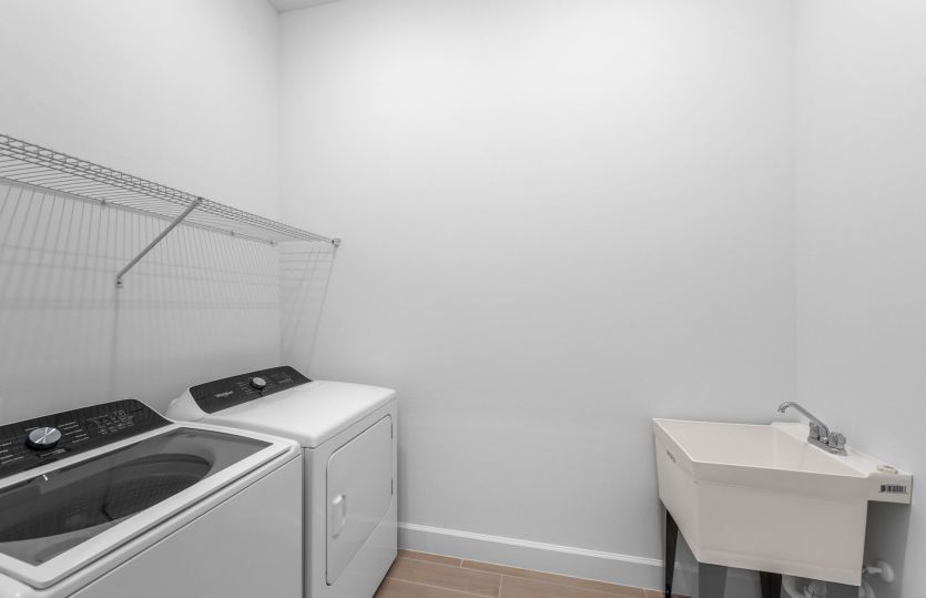 Laundry room with utility sink