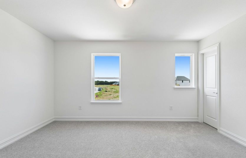 Secondary bedroom with large window